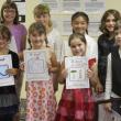 These young authors shared their writing at the Author's Tea party on Friday. Pictured from left, back: Maria West, Ella Cloutier, Vanessa Albert, Haley Downs; front: Sylvia Lee, Julia Truesdell, Gracie Greene, Oscar Martin. Courtesy of Tanya Albert and Lisa Truesdell