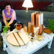 Amé Mundy of West Boothbay Harbor, who designs under the Wooden Whimsy name, diplays some of her functional wood art at Lincoln Art Festival's Arts & Yachts show held at the Boothbay Region Boatyard. GARY DOW/Boothbay Register