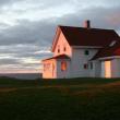 The Monhegan Museum, located on the top of a hill overlooking Monhegan Harbor and Muscongus Bay beyond.