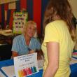 Jean Duncan signs up a customer at last year's Set for Success event. KEVIN BURNHAM/Boothbay Register