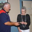 King Lion Mike Giles welcomes new member, Elizabeth McKim. Courtesy of Susie Giles