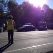 Edgecomb Fire Chief Roy Potter directs traffic on Route 27. RYAN LEIGHTON/Boothbay Register