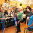 Harbor “crawlers” enjoy the festivities at Slicks boutique in Boothbay Harbor.  RYAN LEIGHTON/Boothbay Register