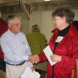 Larry Hayter, left, of the Old Bristol Historical Society, meets Harriet Vaughan of the Whitefield Historical Society, in the Nickels-Sortwell Barn in Wiscasset on September 22. SUSAN JOHNS/Wiscasset Newspaper