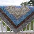 QUILT RAFFLE. The Boothbay Region Lions Club is holding a quilt raffe. Lion Susie Giles made the quilt and Lynn Irish did the quilting on the top. It's a “Log Cabin Handmade quilt” and those who want to buy a raffle ticket can call Giles (207-633-3640) or any Lions Club member. Courtesy of the Lions Club