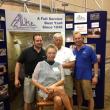 East Boothbay’s Paul E. Luke boatyard hosts Boothbay Region Chamber of Commerce Business After Hours event. In this photo Nora Luke, seated, is surrounded by her sons Keith, left, and Andy, right, and her husband Frank Luke.   