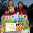 On a brisk Friday night in Alna September 6, two Wiscasset Primary students and best friends, Violet Wilson-Wood, left, and Jasmine Rego sell  iced tea on Route 218 to raise money to save St. Andrews Hospital. Rego's dad Mark Rego was born there. SUSAN JOHNS/Wiscasset Newspaper