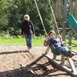 Ethel Stansfield gives Isaac Koskkowski a push on the swing. Stansfield celebrates her 30th year teaching at Sheepscot Valley. RYAN LEIGHTON/Boothbay Register