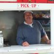 GARY STARANKEWICZ in his doghouse. SUZI THAYER/Boothbay Register