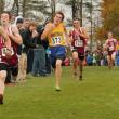 Determination showing in his face, Burnham fought his way to the finish line, leaving other runners in his wake. He finished 16th at 18:48 and fifth for BRHS. SUE MELLO/Boothbay Register