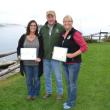 Maine Department of Marine Resources Commissioner Patrick Keliher (center) stands with DMR Manager of the Year, Alison Sirois, a DMR Scientist III (left), and Employee of the Year, Cathy Fetterman, DMR Licensing Manager (right), after each received an award during the department’s annual meeting in September. The Manager of the Year Award was presented to Sirois for overseeing water quality and safety along the entire coastline for the Bureau of Public Healthy. Fetterman received the employee of the year fo