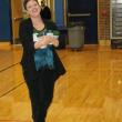 Booster Club president Heather O’Brien brings a load of Parmesan cheese to the banquet table. KEVIN BURNHAM/Boothbay Register