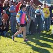 Senior Sophia Thayer walks up to the winner circle after finishing fourth place overall in the state championship race. RYAN LEIGHTON/Boothbay Register