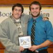 Friends and football teammates. Thomas Cornell, left, gives his friend and football teammate Jason Maddocks a hug after Maddocks gave his most valuable player plaque to Cornell at the BRHS fall sports awards. KEVIN BURNHAM/Boothbay Register