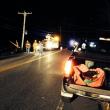 Central Maine Power workers attempt to restore power after a car clipped a utility pole on November 13. MIKE MARR/Boothbay Register