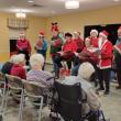 The N'oreasters Barbershop singers are spreading Christmas cheer through song. Courtesy of Kathy Robatille