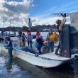 Clean-up volunteers unload trash collected from along the shoreline of the Damariscotta River on Nov. 1. Courtesy of Coastal Rivers