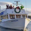 Santa and his entourage arriving by boat to Whale Park Dec. 7. FRITZ FREUDENBERGER/Boothbay Register