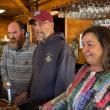 Darrell Gudroe, left, Steve Edwards and Lisa Hallinan serve the food at the Dec. 2 Community Lunch. Jen Mitchell photo