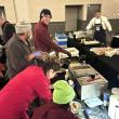 Lori Mitchell (in red) and the crew of Boothbay Craft Brewery whip together 400 lobster bites. Courtesy of Lori Mitchell