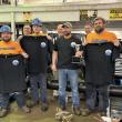 The "Mud Dogs," consisting of Gage Seavey, Cody Brown, Weston Alley and Shawn Simmons, take home the trophy at annual pipe tapping competition. Courtesy of the Boothbay Region Water District