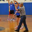 Before the opening tip, referee Clayton Pottle calls a technical foul on Korey Lewis for "indecent exposure." KEVIN BURNHAM/Boothbay Register
