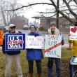 The weather may have been dreary but that didn't stop protestors from gathering to challenge the possible privatization of the USPS. ISABELLE CURTIS/Boothbay Register