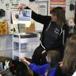 Michelle Rancourt of Midcoast Humane reads to students about Maggie the shelter dog. ISABELLE CURTIS/Boothbay Register