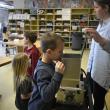 Students take a peek inside the shredder. ISABELLE CURTIS/Boothbay Register