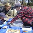 Jackie Branch, right, leads a seaweed pressing activity. FRITZ FREUDENBERGER/Boothbay Register