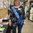 Beth Hardwick, wearing her "Officially Retired" sash and crown, during her retirement celebration in the stock room of the Boothbay Harbor Hannaford on Thursday, May 15. KEVIN BURNHAM/Boothbay Register
