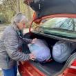 Betsy Davis loads up her car with out-of-season clothes to donate to the Salvation Army. ISABELLE CURTIS/Boothbay Register