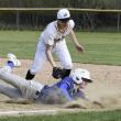 Sam Markowitz slides into first after attempting to steal against Maranacook May 13. FRITZ FREUDENBERGER/Boothbay Register