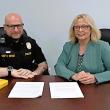 Boothbay Harbor Police Chief Doug Snyder and State Rep. Holly Stover review their bill.  JANE CARPENTER/Boothbay Register
