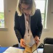 Catherine Williamson appraises an 1862 bible. FRITZ FREUDENBERGER/Boothbay Register