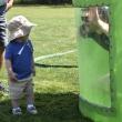 Hunter Arsenault surprises his son, Calder, from inside the dunk tank. FRITZ FREUDENBERGER/Boothbay Register