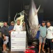 The Locked n Loaded team with their prize-winning 832-pound tuna. From left Bill Clifford, Charlie Mayrer, Nick Morley, Drew Meader, Andrew Morley, and Matt Burnham. Courtesy Sarah Morley. 