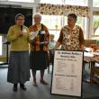 Treasurer Amy Bykowski, President Patty Colhoun and Secretary Kevin Bowler share the group's annual donation and scholarship figures. ISABELLE CURTIS/Boothbay Register