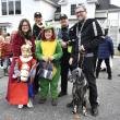 The Kurtz family led the parade this year. From left to right, Khristina, Jonah, Theo, Nate, and Archie the dog. Also pictured are BHPD officers Larry Brown and Ryan Potter. FRITZ FREUDENBERGER/Boothbay Register