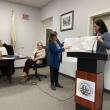 Lauren Stockwell, center, and Joana Tourangeau, far right, present a plan for a float project at 49 Atlantic Avenue to the Boothbay Harbor Selectboard Dec. 8. FRITZ FREUDENBERGER/Boothbay Register