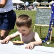 A pie eating contestant at the Boothbay Civic Association's Fourth of July celebration on the Boothbay Common. FRITZ FREUDENBERGER/Boothbay Register