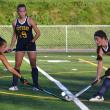 Boothbay's Zuri Smith battles a Lisbon defender as sister Moriah is nearby waiting to assist. KEVIN BURNHAM/Boothbay Register