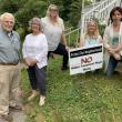 From left, John Davis, Jane Johnston, Amanda Dawnrich, Tanya Hammond and Shannon Babcock, pictured Aug. 29, are fighting putting the sewer plant where public works is now. SUSAN JOHNS/Wiscasset Newspaper