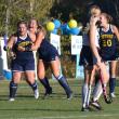 Ella Watts, left, gets a hug from fellow senior Tatum French as teammates rush in to congratulate Watts after she scored her second career goal on Monday. Watts, who normally plays defense, was inserted into the offense by coach Jax Hepburn in the third quarter in the one-sided contest. KEVIN BURNHAM/Boothbay Register