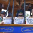 The trolley got a prison-themed makeover July 16 as locals hopped aboard to raise "bail money" for continued maintenance of the historic vehicle. From left, Allan Osborn, Tricia Campbell and Linda Osborn. ISABELLE CURTIS/Boothbay Register