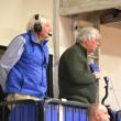 Channel 7 announcers stand for the national anthem. KEVIN BURNHAM/Boothbay Register