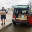 Independent contractor Scott Carpenter of Edgecomb loads packages at the Boothbay Harbor Post Office. ISABELLE CURTIS/Boothbay Register