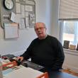 Editor Kevin Burnham at his desk at the Boothbay Register. Connie Hartley photo