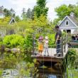 A family taking in one of the many gorgeous views at Coastal Maine Botanical Gardens. Photo Credit: Coastal Maine Botanical Gardens