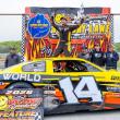 An excited Josh St. Clair climbs out of his car after winning the 2026 Coastal 200. Jasen Dickey Photography